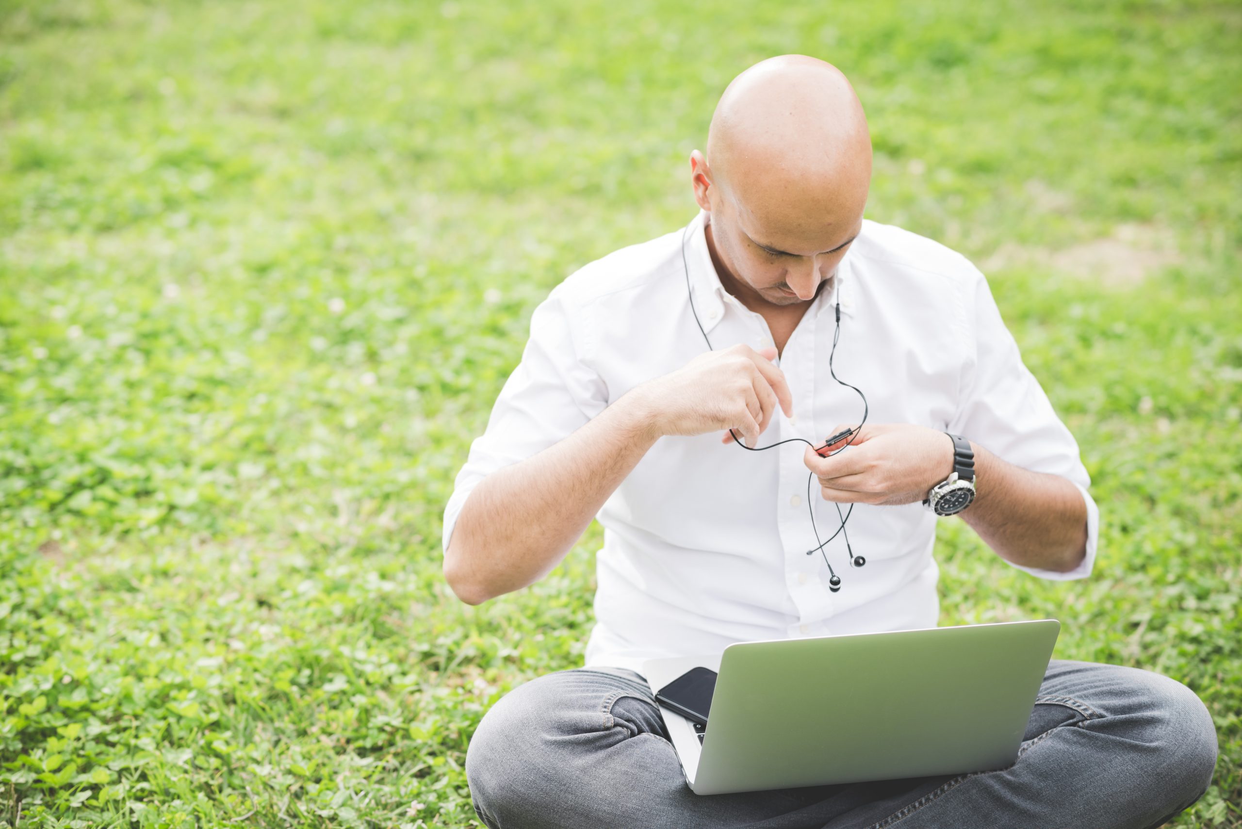 graphicstock-young-contemporary-businessman-remote-working-sitting-outdoor-in-a-city-park-using-computer-and-earphones-portability-small-business-business-call-concept_rTAZ7kt1- graphicstock-young-contemporary-businessman-remote-working-sitting-outdoor-in-a-city-park-using-computer-and-earphones-portability-small-business-business-call-concept_rTAZ7kt1-